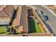 Aerial view of private backyard featuring artificial turf, putting green, patio furniture, and a built-in BBQ area at 3491 Argiento Ave, Henderson, NV 89044