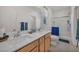 A bathroom showcasing a double sink vanity, a glass shower, and modern fixtures at 3491 Argiento Ave, Henderson, NV 89044
