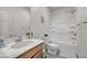 Clean bathroom with a single sink vanity, toilet, and bathtub-shower combo at 3491 Argiento Ave, Henderson, NV 89044