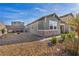 Charming single-story home featuring stone accents, desert landscaping, and a private front yard at 3491 Argiento Ave, Henderson, NV 89044