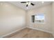Cozy bedroom features a neutral color palette and a window view of the outside at 3520 Malibou Ave, Pahrump, NV 89048