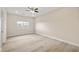 Bright bedroom features a ceiling fan, recessed lighting, and a view from the window at 3520 Malibou Ave, Pahrump, NV 89048