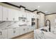 Chef's kitchen featuring stainless steel appliances, white cabinets, and marble countertops at 3520 Malibou Ave, Pahrump, NV 89048