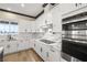 Gourmet kitchen featuring stainless steel appliances, custom cabinets, and marble backsplash at 3520 Malibou Ave, Pahrump, NV 89048