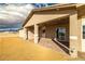 This covered patio has a wood plank ceiling and lovely tile work at 3520 Malibou Ave, Pahrump, NV 89048