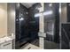 Modern shower featuring black marble and a rainfall shower head at 3520 Malibou Ave, Pahrump, NV 89048