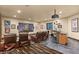 Entertainment room featuring a large screen, comfortable seating, and a bar area at 5764 Aspen Falls Cir, Las Vegas, NV 89149