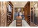 Large walk-in closet with custom shelving, drawers, and center island for optimal organization at 5764 Aspen Falls Cir, Las Vegas, NV 89149