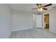 Spacious bedroom with connecting bathroom and modern gray flooring throughout at 6250 W Flamingo Rd # 43, Las Vegas, NV 89103