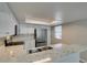 Modern kitchen features stainless steel appliances, and a breakfast bar at 6250 W Flamingo Rd # 43, Las Vegas, NV 89103