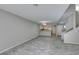 Large living space with an open layout, tile flooring, and view of the kitchen at 6250 W Flamingo Rd # 43, Las Vegas, NV 89103