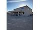 Backyard featuring an expansive unfinished landscape and a covered patio at 7142 Twilight Rider Ct, Las Vegas, NV 89118