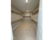 Large walk-in closet offering ample shelving space for organized storage at 7199 Twilight Rider Ct, Las Vegas, NV 89118