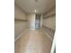 Spacious walk-in closet with multiple shelves, perfect for maximizing storage and organization at 7199 Twilight Rider Ct, Las Vegas, NV 89118