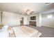 Spacious main bedroom with neutral decor, ceiling fan, and modern furnishings at 7856 Stone Forest St, North Las Vegas, NV 89084