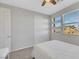 Cozy bedroom showcasing a large closet, bright windows, and neutral walls at 787 Cottonwood Hill Pl, Henderson, NV 89011