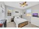 Relaxing bedroom featuring carpeted floors, window views, and tasteful decorations at 787 Cottonwood Hill Pl, Henderson, NV 89011