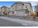 Beautiful new construction home featuring a spacious two-car garage and modern architectural details at 787 Cottonwood Hill Pl, Henderson, NV 89011