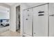 Clean shower with tile walls and black shampoo shelves is connected to a bedroom and walk-in closet at 787 Cottonwood Hill Pl, Henderson, NV 89011