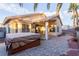 Backyard features a hot tub and a brick patio, great for outdoor entertaining at 8433 Sea Glen Dr, Las Vegas, NV 89128