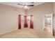 Bedroom featuring neutral walls, carpet, and a ceiling fan for added comfort at 8433 Sea Glen Dr, Las Vegas, NV 89128