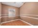 Bedroom featuring hard wood flooring, window and neutral paint at 8433 Sea Glen Dr, Las Vegas, NV 89128