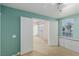 Office area showcasing built in cabinets, double entry doors, and a window with privacy blinds at 8433 Sea Glen Dr, Las Vegas, NV 89128