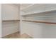 Spacious walk-in closet featuring built-in shelving and hanging rods at 8433 Sea Glen Dr, Las Vegas, NV 89128