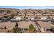 Wide aerial view of the community featuring well-maintained homes with desert landscaping and neighborhood street layout at 870 Santa Maria Way, Mesquite, NV 89027