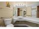 Accessible bathroom features vanity area, mirror and toilet at 870 Santa Maria Way, Mesquite, NV 89027