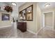 Spacious foyer with a decorative mirror and tile flooring at 870 Santa Maria Way, Mesquite, NV 89027