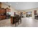 Open-concept kitchen featuring an island, granite countertop, and stainless steel appliances at 870 Santa Maria Way, Mesquite, NV 89027