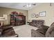 Spacious living room featuring plush seating, a large TV, and stylish decor at 870 Santa Maria Way, Mesquite, NV 89027
