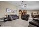 Open-concept living room connecting to the kitchen and dining area, with comfortable seating at 870 Santa Maria Way, Mesquite, NV 89027