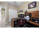 Office space with built-in desk, storage, and comfortable seating at 870 Santa Maria Way, Mesquite, NV 89027
