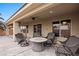A covered patio features comfortable seating, perfect for outdoor entertaining and relaxation at 870 Santa Maria Way, Mesquite, NV 89027