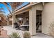 Inviting covered patio with comfortable seating, perfect for relaxing outdoors at 870 Santa Maria Way, Mesquite, NV 89027