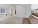 Second-floor hallway with a sofa, white walls, and a view of the staircase at 10899 Royal Highlands St, Las Vegas, NV 89141