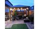 Relaxing backyard featuring a gazebo with outdoor seating and ample space at 10976 Bluebell Basin Rd, Las Vegas, NV 89179