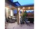 Covered patio with string lights and a tiled floor at 10976 Bluebell Basin Rd, Las Vegas, NV 89179