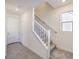 Staircase with white banister and carpeted steps leading to the upper level at 11576 Ashy Storm Ave, Las Vegas, NV 89138