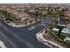 Aerial view of neighborhood entrance and landscaping at 12118 La Carta Ct, Las Vegas, NV 89138