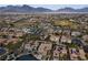 Panoramic aerial view of the community with mountain views and lush landscaping at 12118 La Carta Ct, Las Vegas, NV 89138