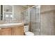 Bathroom featuring a large mirror, shower and vanity at 12118 La Carta Ct, Las Vegas, NV 89138