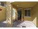 Cozy covered entryway featuring neutral stucco and a view into the home at 1525 Spiced Wine Ave # 12103, Henderson, NV 89074