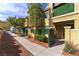 Inviting townhome exterior featuring desert landscaping and a well-maintained walkway at 1525 Spiced Wine Ave # 12103, Henderson, NV 89074