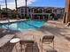 A refreshing community pool surrounded by lounge chairs, offering a perfect spot for relaxation at 1525 Spiced Wine Ave # 12103, Henderson, NV 89074