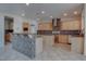 Spacious kitchen featuring tile backsplash and stainless steel appliances at 1534 Waterford Falls Ave, Las Vegas, NV 89123