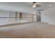 Open carpeted loft area with railing, chandelier and views to other rooms at 1534 Waterford Falls Ave, Las Vegas, NV 89123