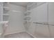 Walk-in closet with shelving and ample storage space at 1534 Waterford Falls Ave, Las Vegas, NV 89123